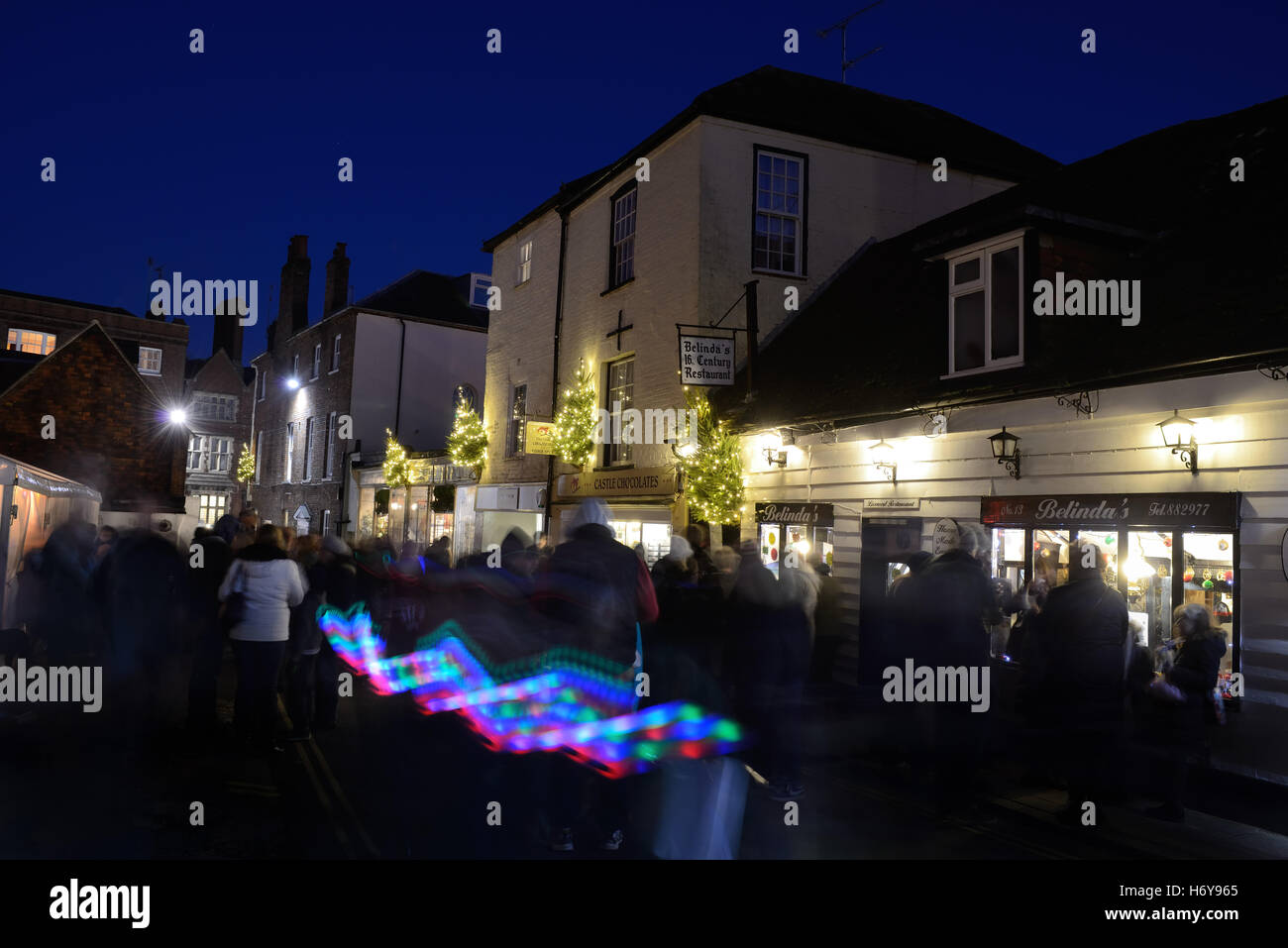 People enjoy the Arundel By Candlelight Christmas event in the historic town of Arundel in West