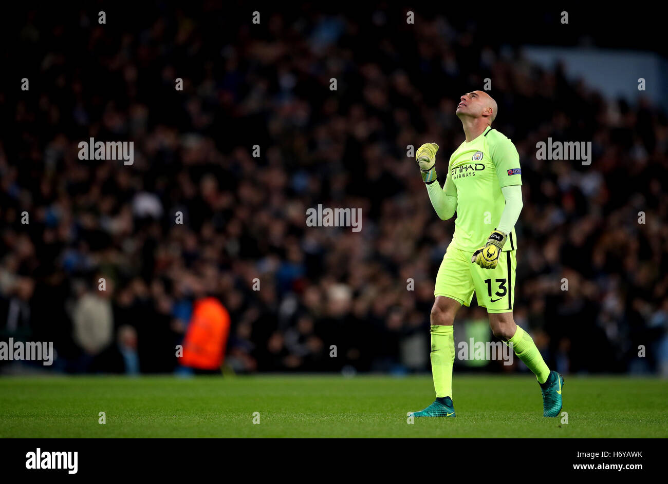 Manchester City goalkeeper Willy Caballero celebrates his side's third goal of the game during the UEFA Champions League match at the Etihad Stadium, Manchester. Stock Photo