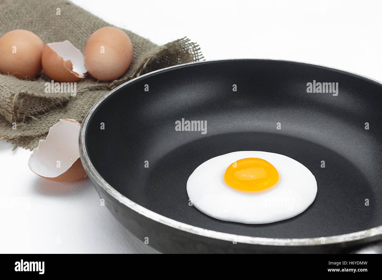Fried egg on a frying pan Stock Photo - Alamy