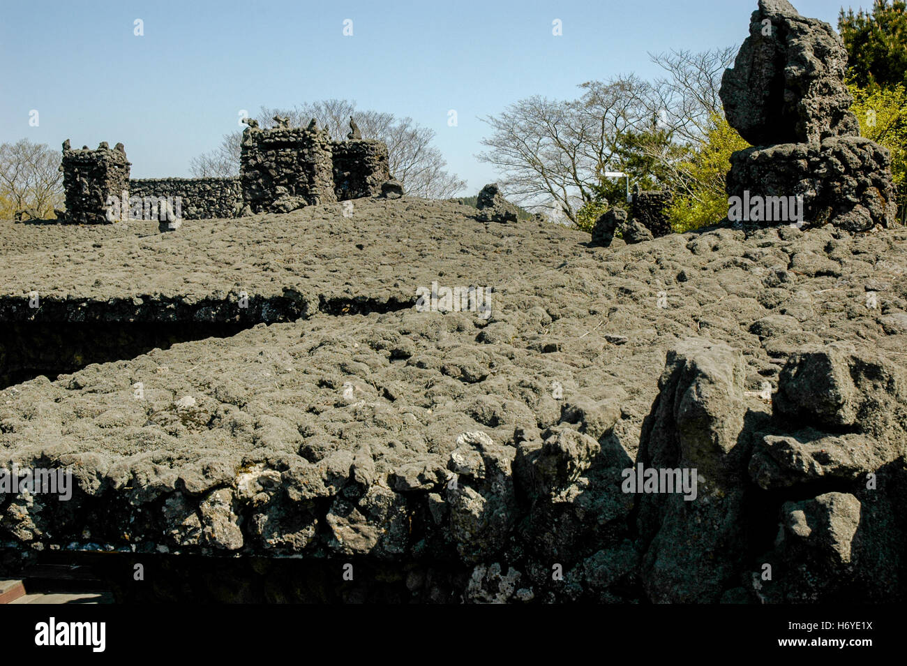 volcanic rock used for roofs of buildings. sangumburi volcano crater rim. jeju (cheju) island. sth. korea Stock Photo