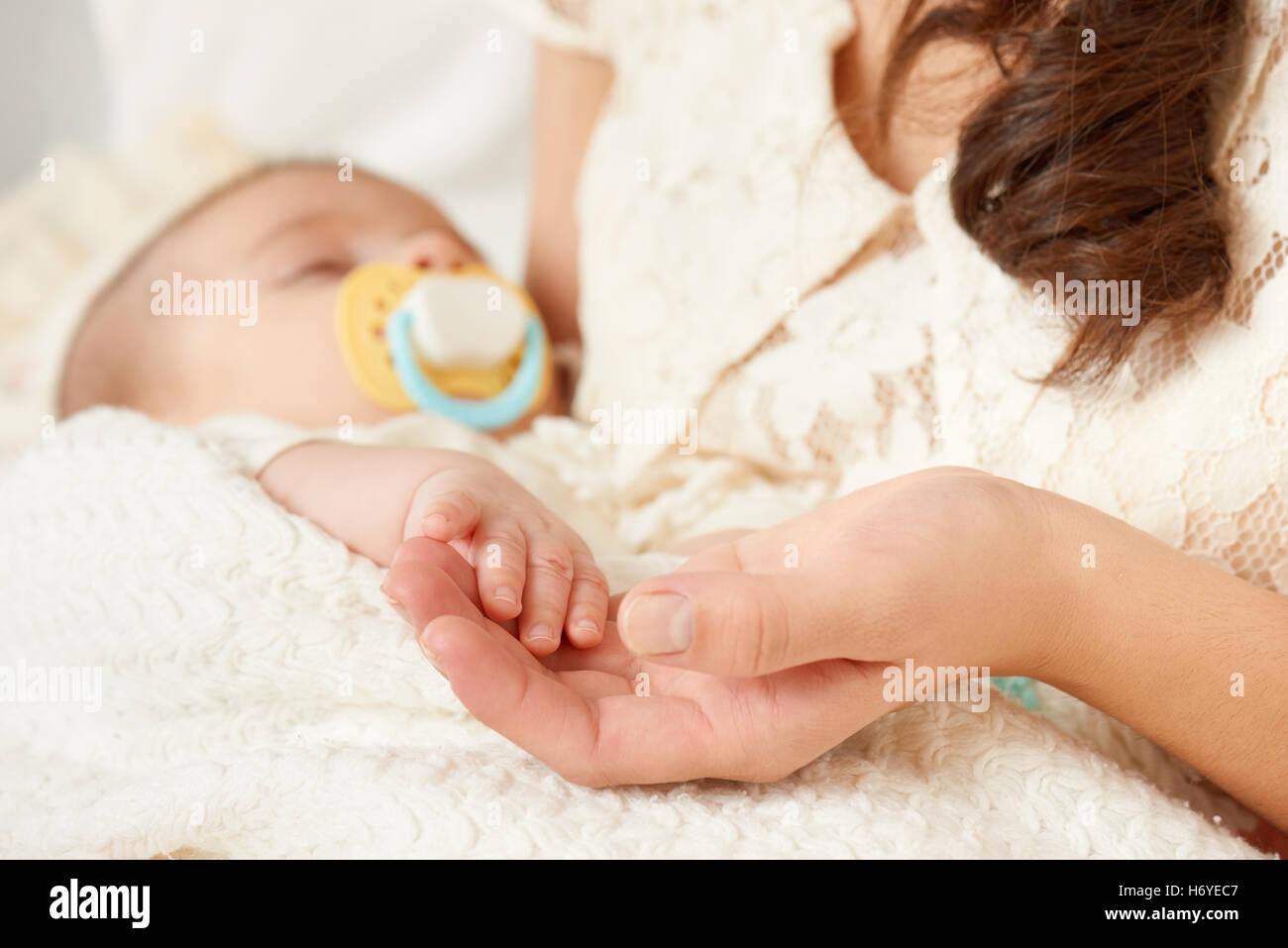 baby sleep in mother hand, happy maternity concept Stock Photo Alamy