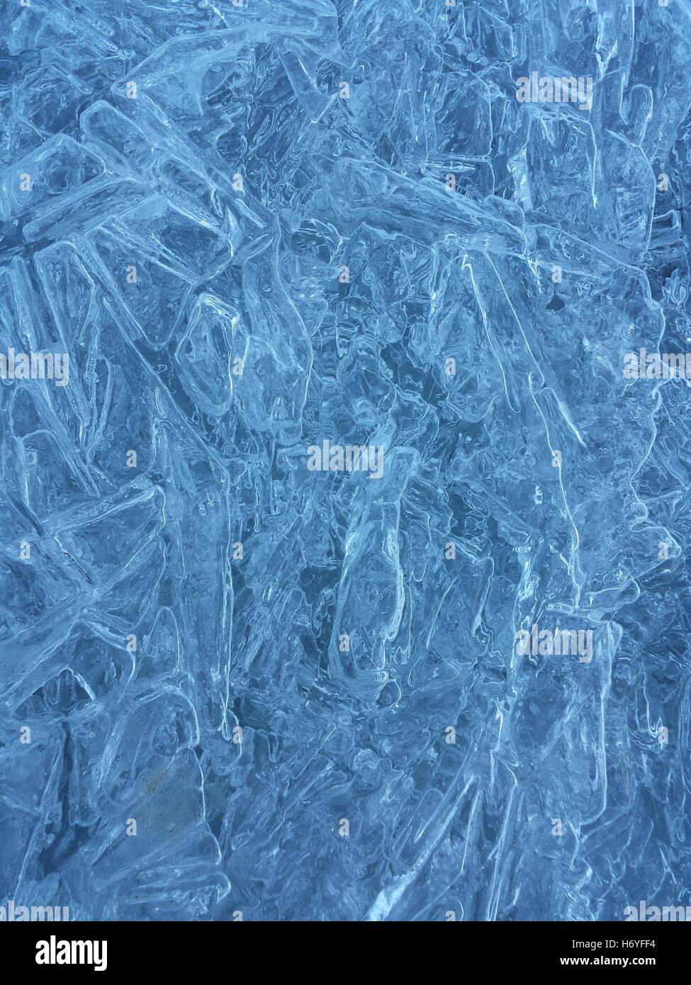 beautiful fresh water blue ice background in northern wilderness Stock