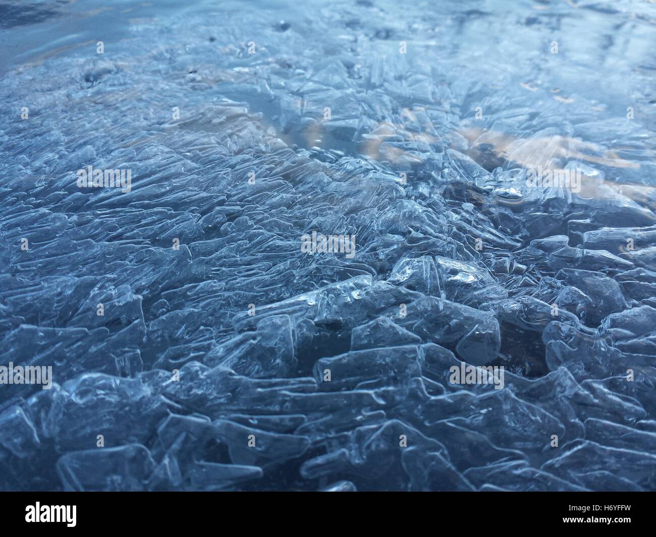 beautiful fresh water blue ice background in northern wilderness Stock