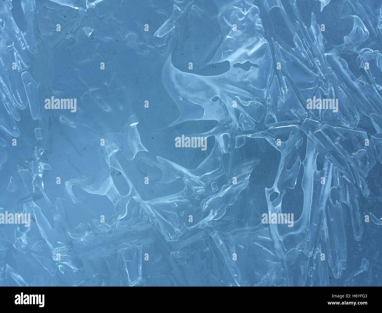 beautiful fresh water blue ice background in northern wilderness Stock