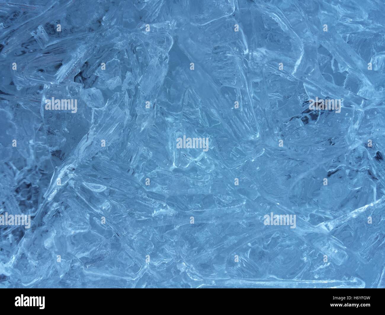 beautiful fresh water blue ice background in northern wilderness Stock