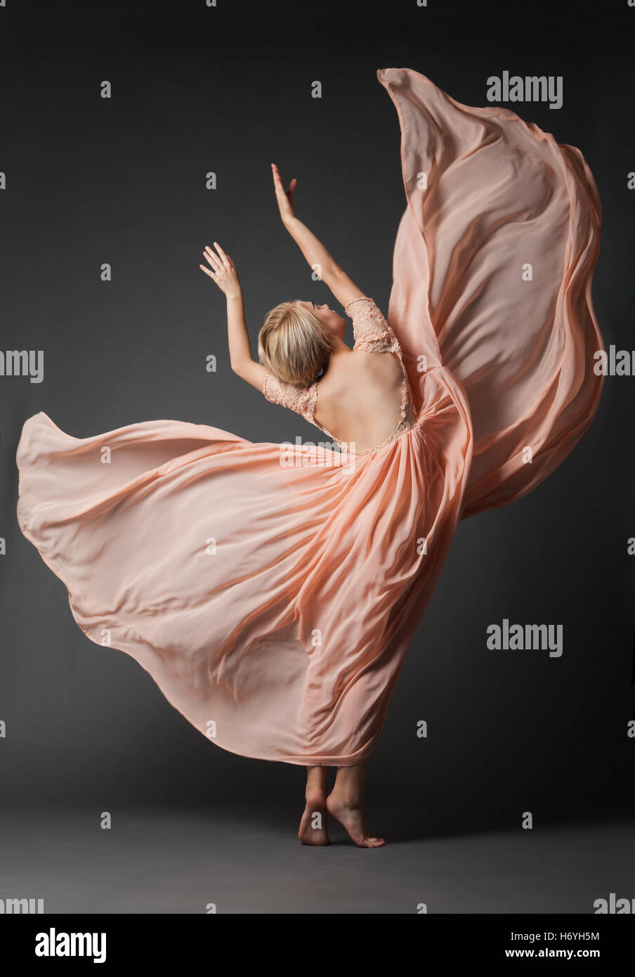 Dancing woman in black dress hi-res stock photography and images - Alamy
