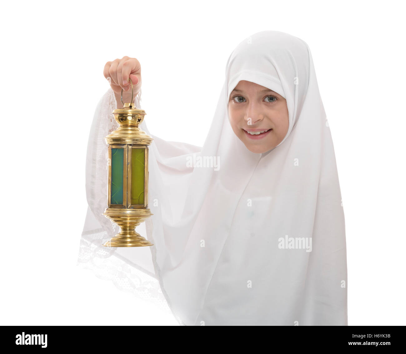 Happy Muslim Girl Holding Ramadan Lantern Isolated on White Background Stock Photo