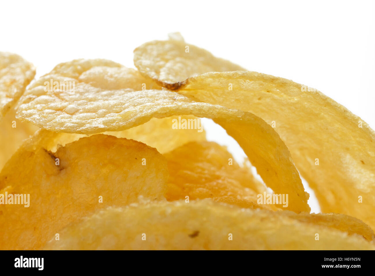 Potato crisps or chips close up on white background Stock Photo Alamy