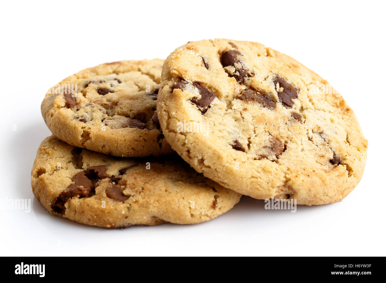 Three light chocolate chip cookies isolated on white. In perspective