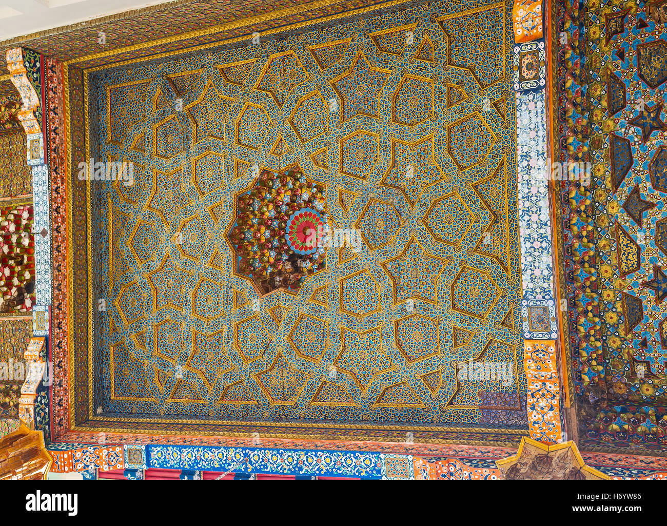 The multi-faceted stars prevail in the ceiling pattern in Sheikh Nakshbund Mausoleum Stock Photo