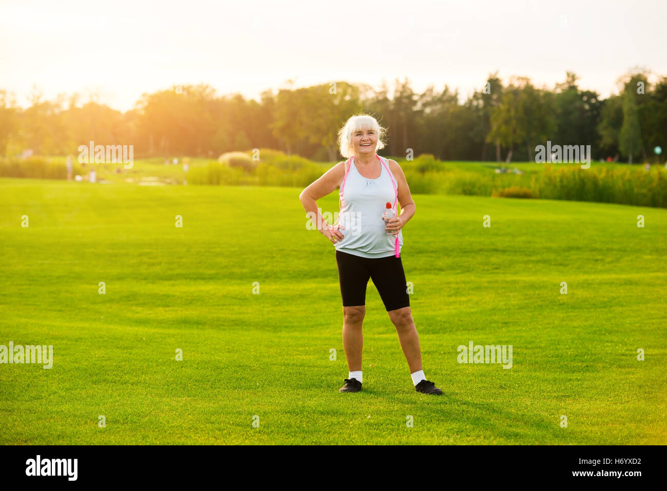 Senior woman with water bottle Stock Photo Alamy