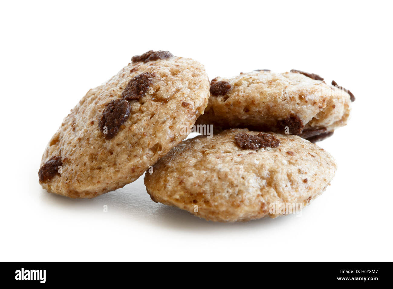 Three chocolate chip cookies cereal isolated on white Stock Photo Alamy
