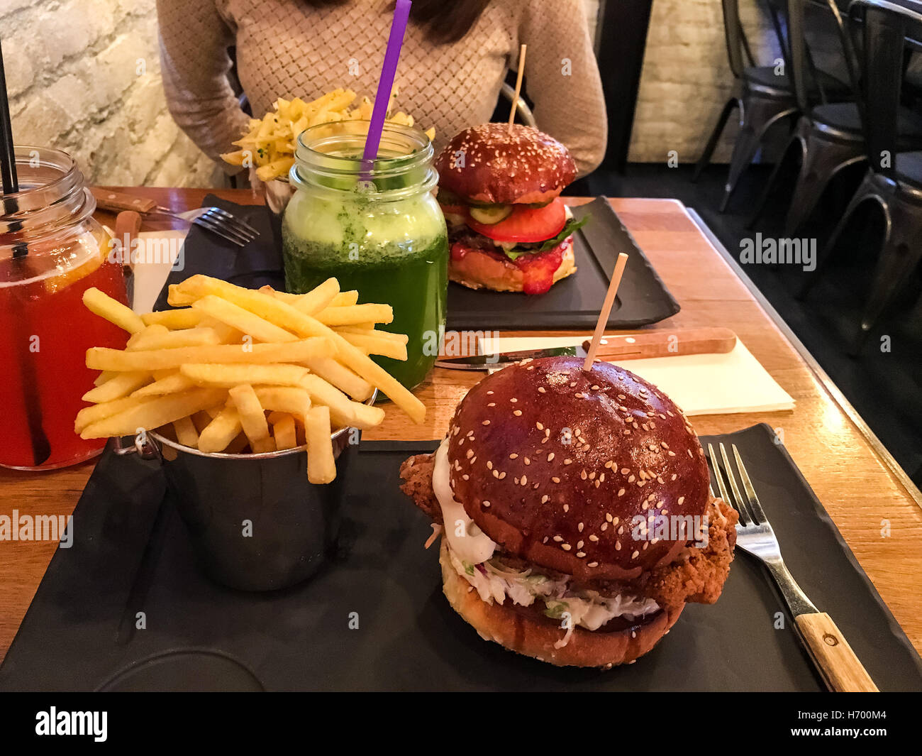 Burgers, French Fries And Lemonade In Fast Food Restaurant Stock Photo