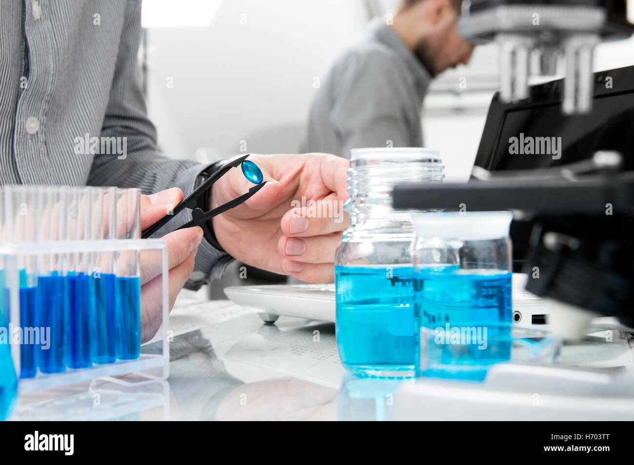 Scientist makes research on a new drug in laboratory Stock Photo Alamy