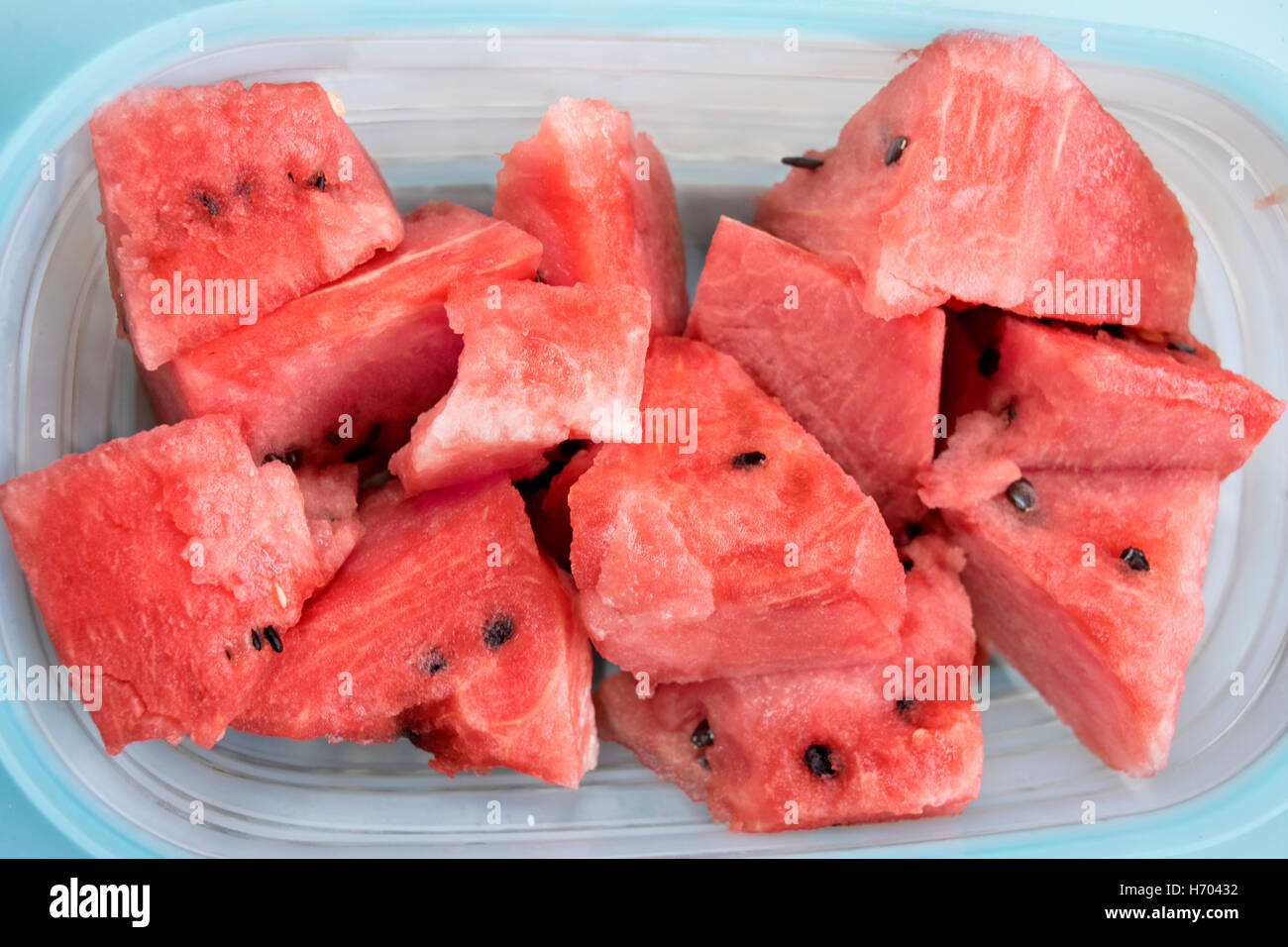 refreshing ripe watermelon on a table cut in cube Stock Photo