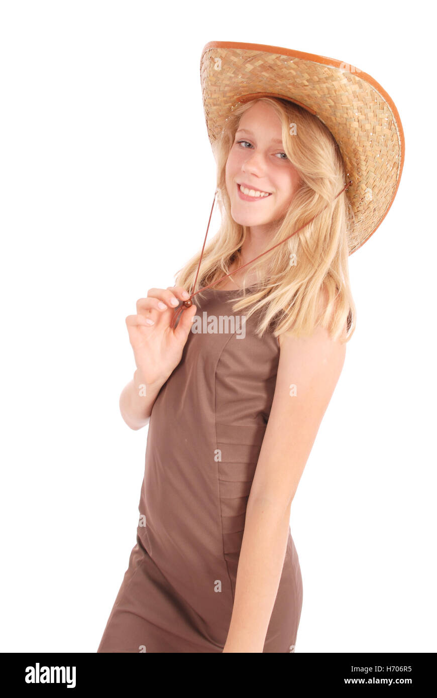 Pretty thirteen year old girls wearing a big floppy straw sun hat