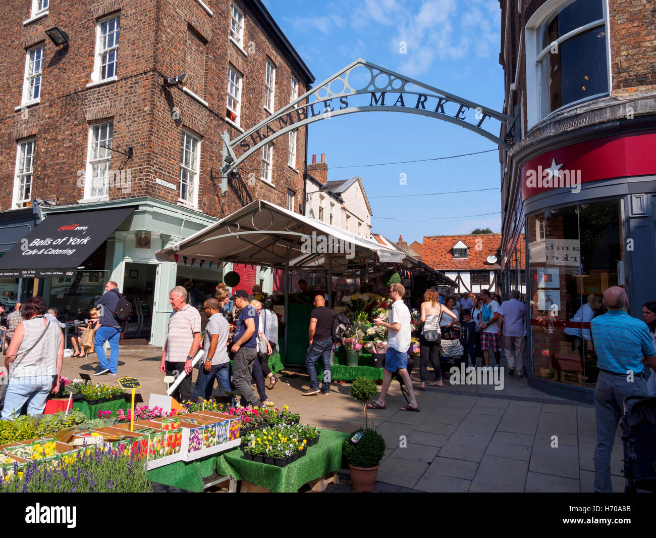 Flower market at the entrance to Shambles Market, York, England Stock