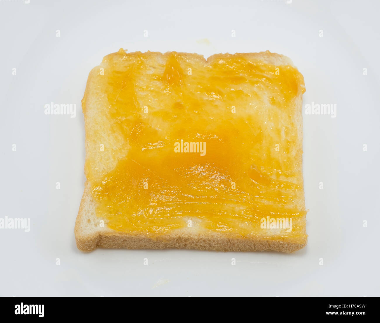 thai custard and sliced bread,white background Stock Photo