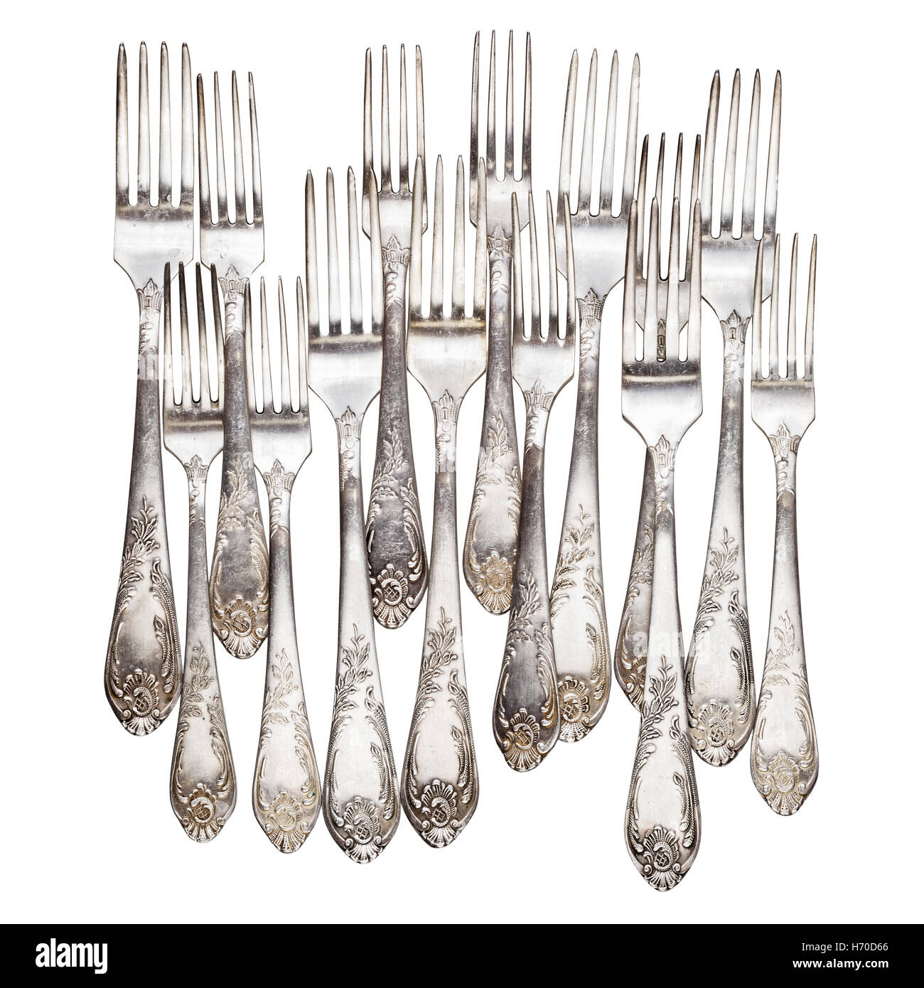 Aged vintage silver forks isolated on white background. Clipping path
