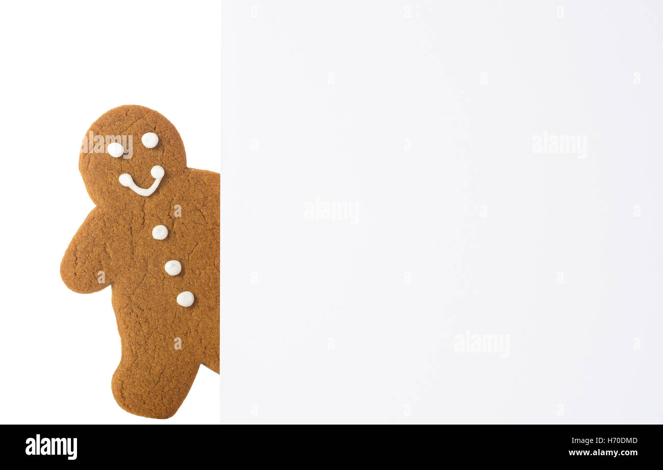 Gingerbread with happy smiling face with advertising board Stock Photo