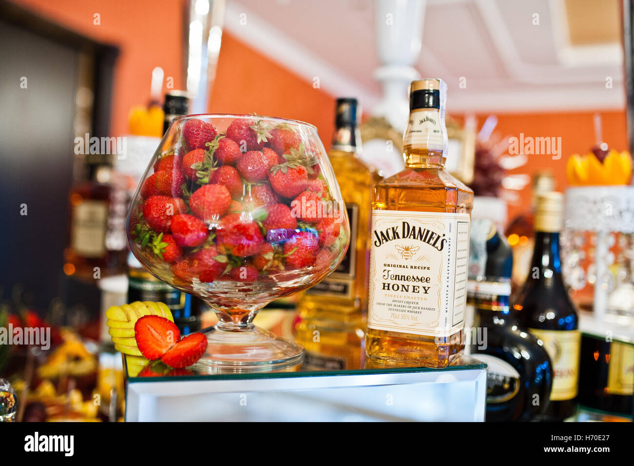Hai, Ukraine - October 25, 2016: Jack Daniel's Honey on buffet table with strawberries Stock Photo