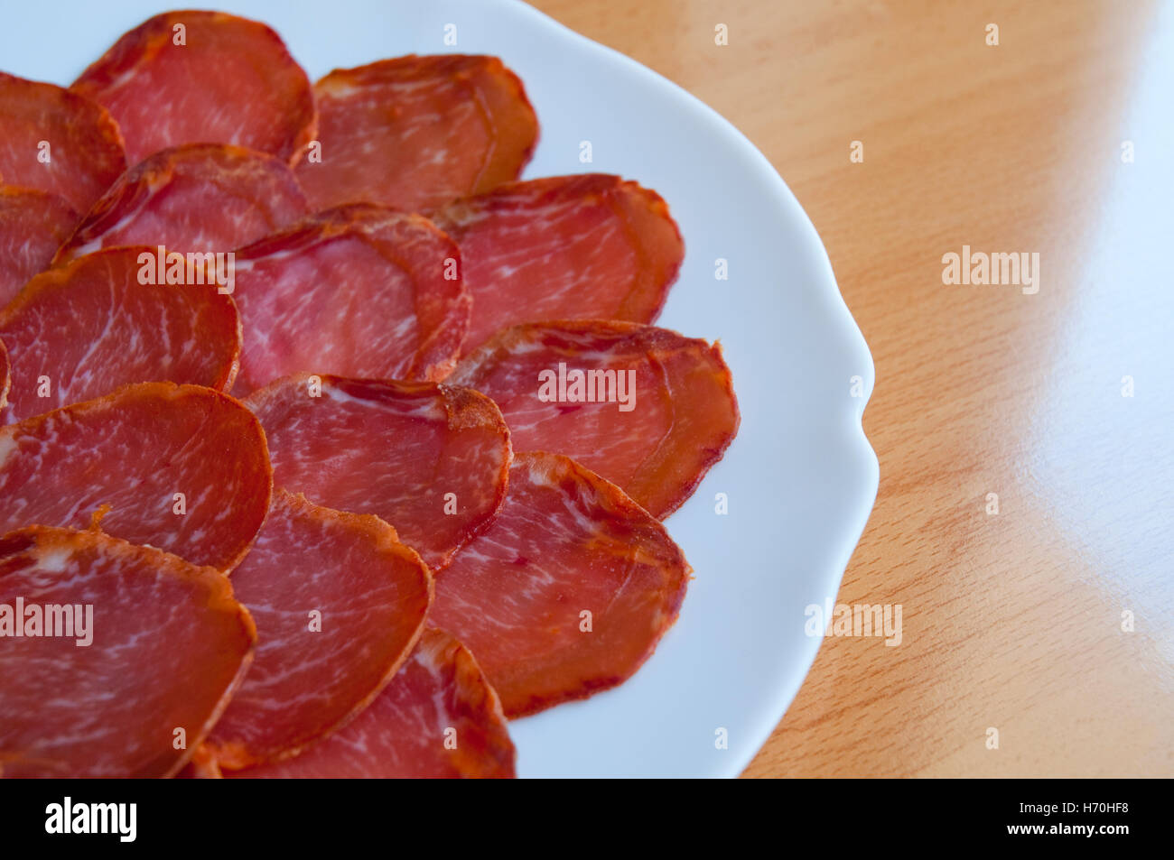 Sliced Iberian loin. Close view. Stock Photo