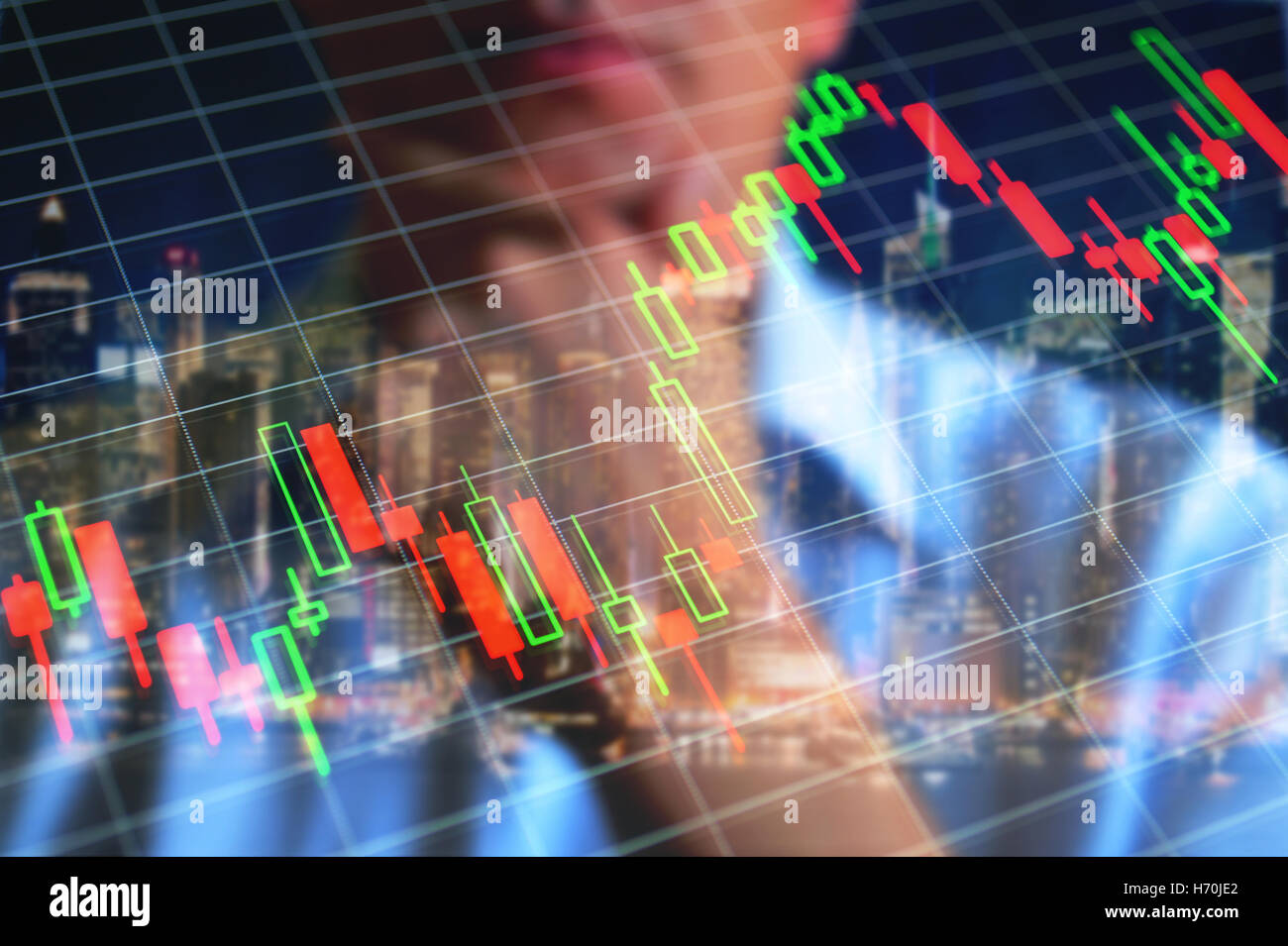 Stock market chart, stock market, financial market, forex, economy background. Person trader at background of screen with volatile stock market graph. Stock Photo