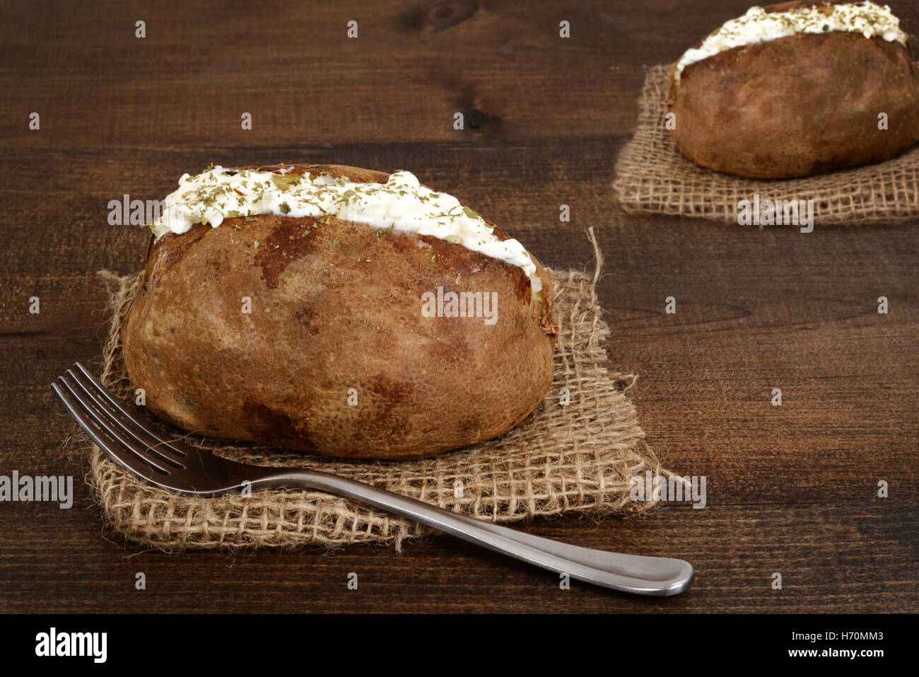 Jacket potato butter chives hires stock photography and images Alamy