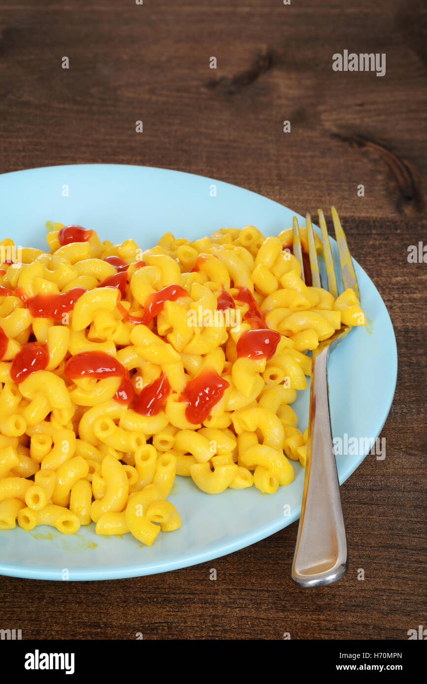 closeup macaroni and cheese with ketchup Stock Photo
