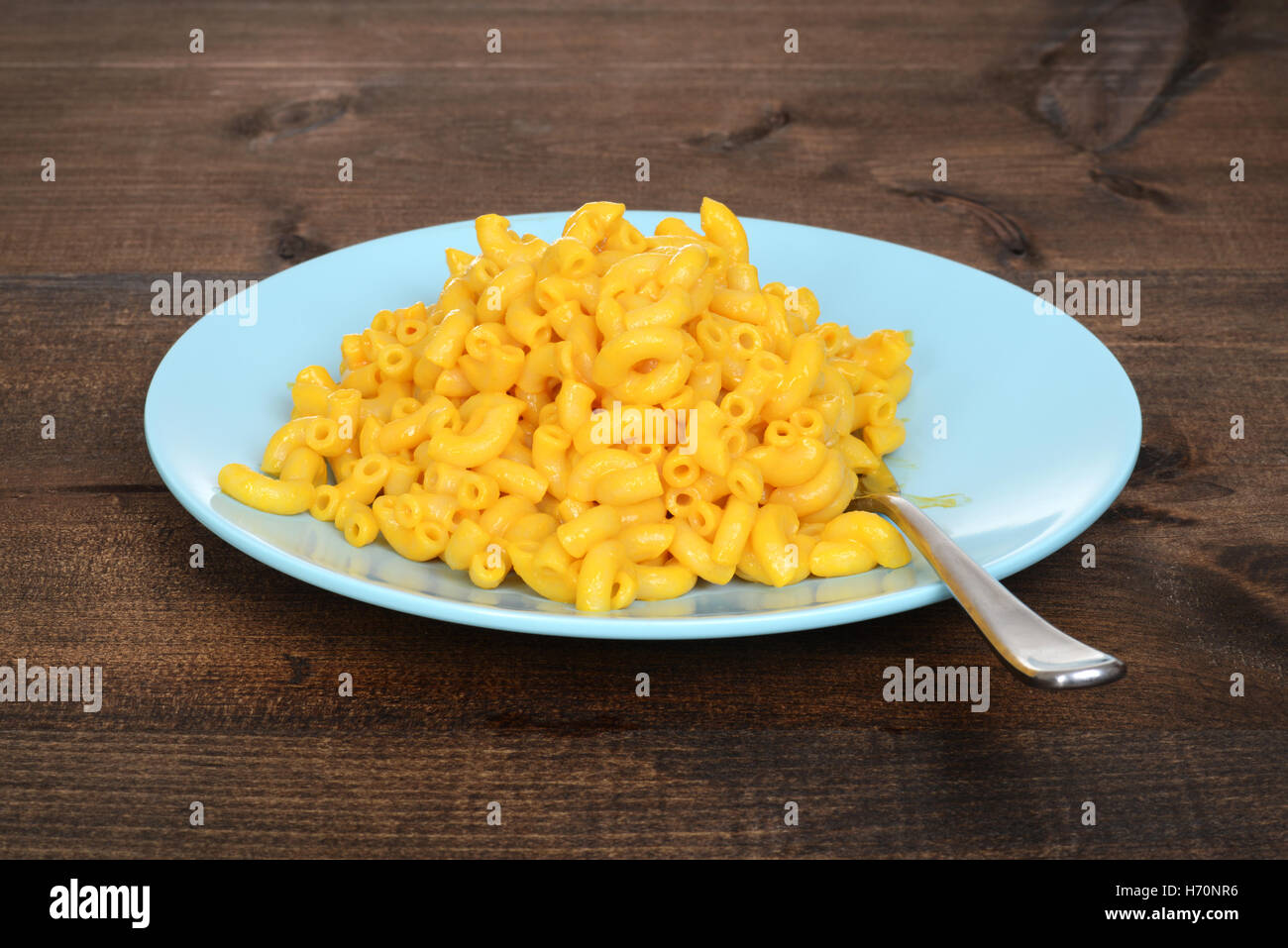 macaroni and cheese with fork on plate Stock Photo