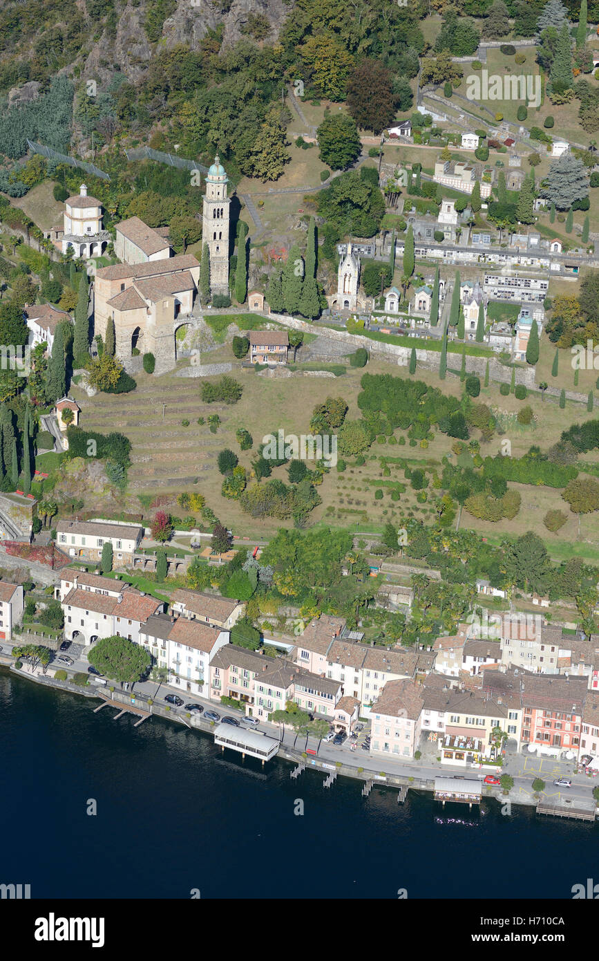 AERIAL VIEW. Picturesque lakeside town of Morcote. Lake Lugano, Canton of Ticino, Switzerland. Stock Photo
