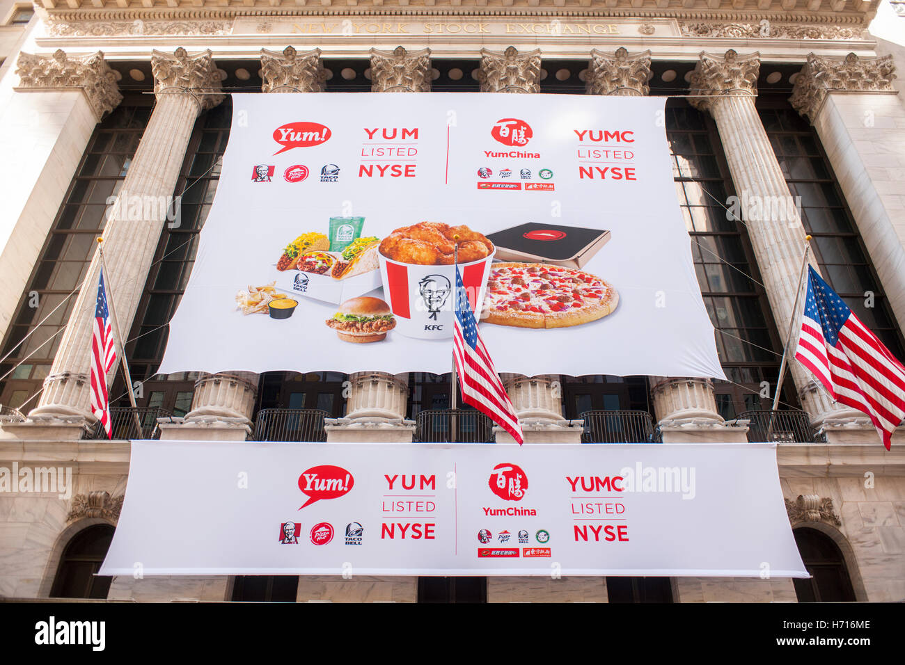 The New York Stock Exchange is decorated for the first day of trading of Yum China Holdings after its separation from Yum Brands. Yum China has exclusive rights to KFC, Pizza Hut and Taco bell in China. The company will trade under the symbol "YUMC".  (© Richard B. Levine) Stock Photo