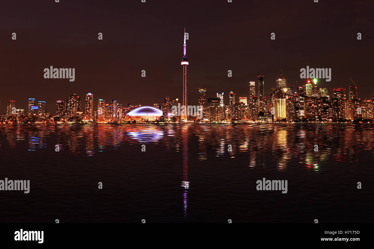 Toronto Skyline at night with a reflection in Lake Ontario, Canada Stock Photo