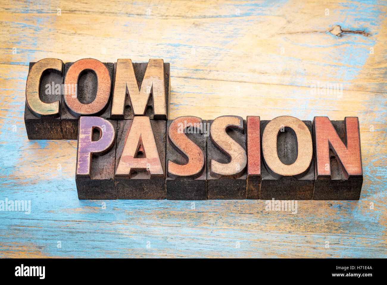 compassion - word abstract in vintage lettepress wood type against ...