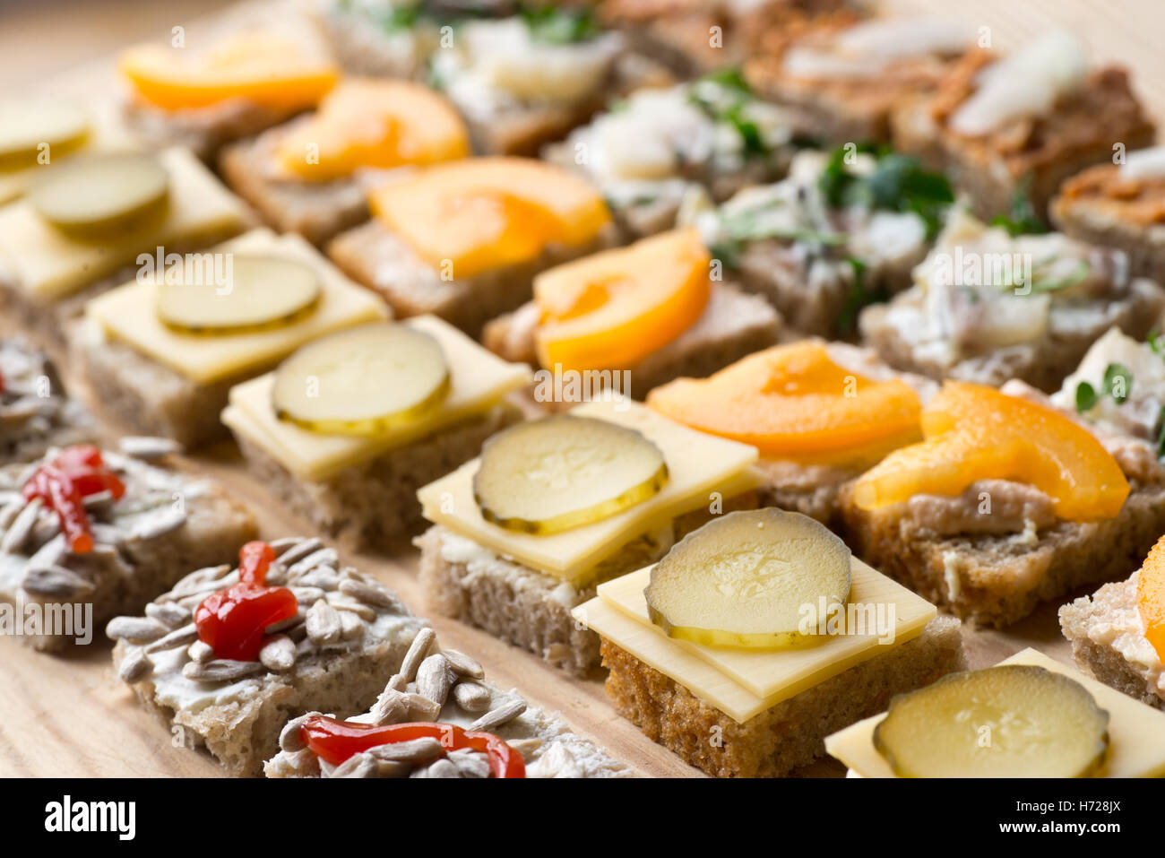 small homemade canapes variety of finger food Stock Photo