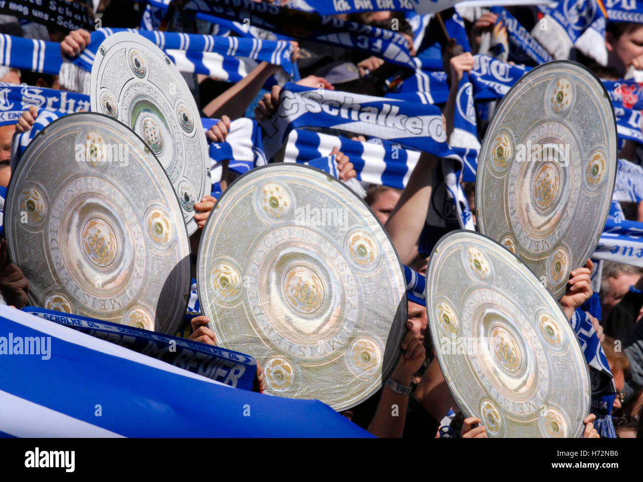 Schalke fans with Meisterschale trophy mockups, match FC Schalke 04 v VfL  Wolfsburg football clubs in Gelsenkirchen Stock Photo - Alamy