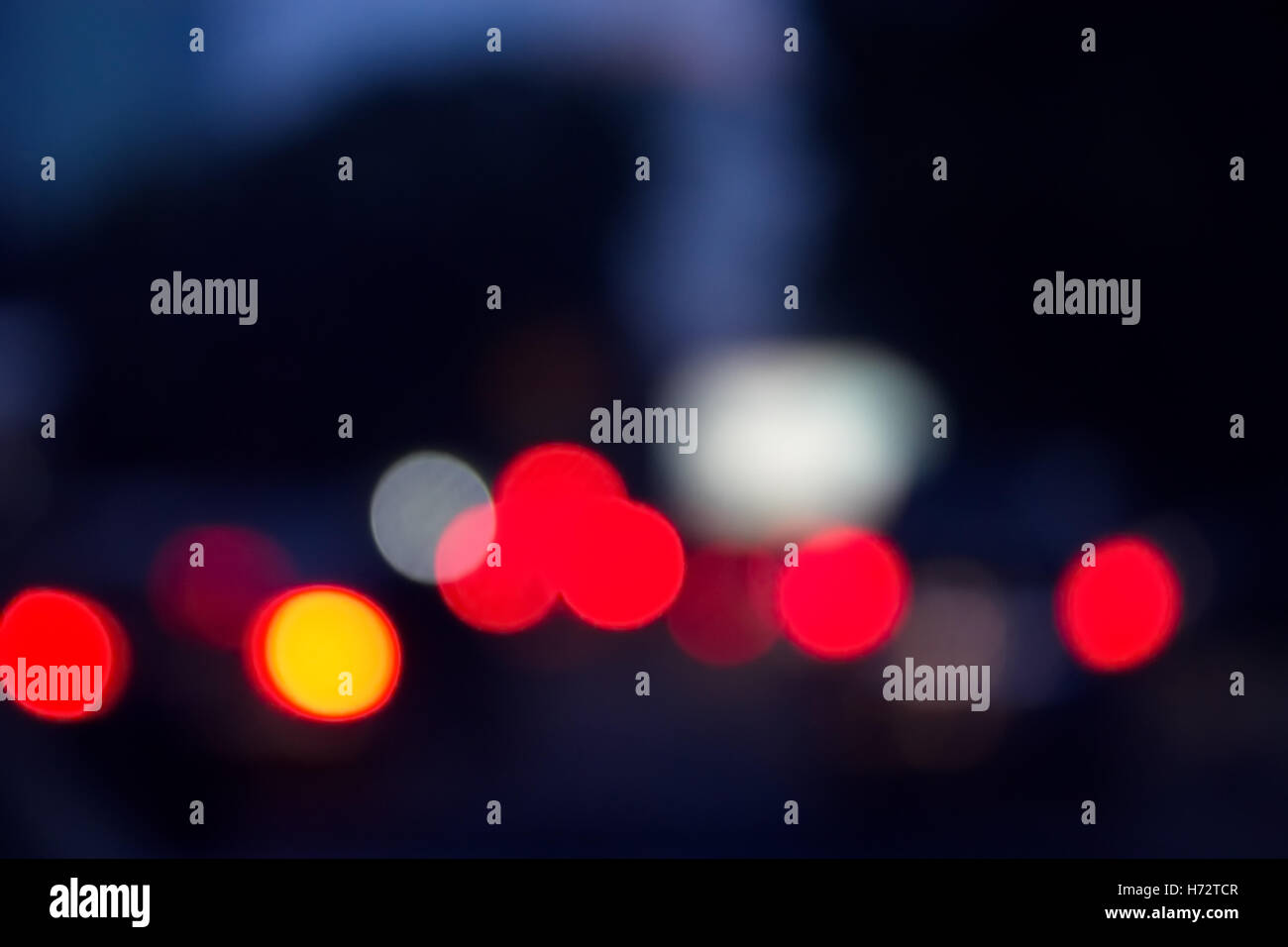 Blur/defocus vehicles tail lights at dawn or dusk. Stock Photo