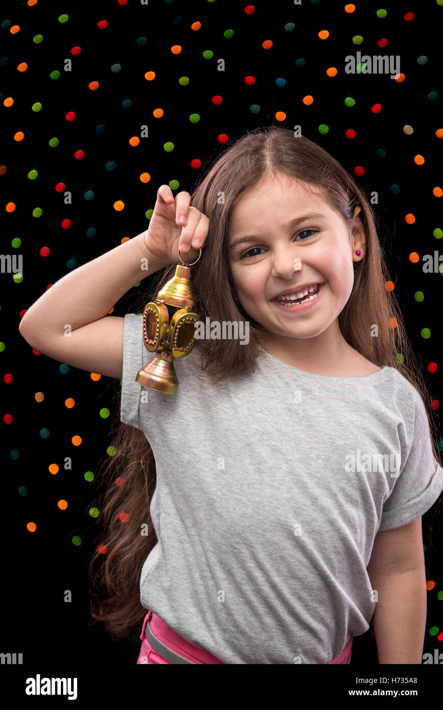 Little Happy Girl Celebrating with Ramadan Lantern Stock Photo