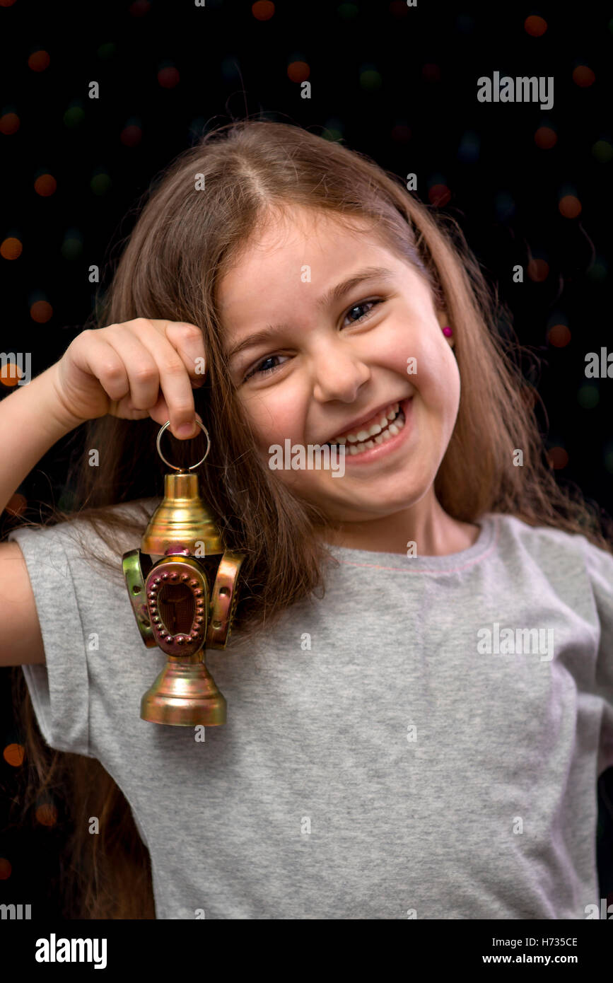 Little Sweet Girl Smiling with Ramadan Lantern Stock Photo