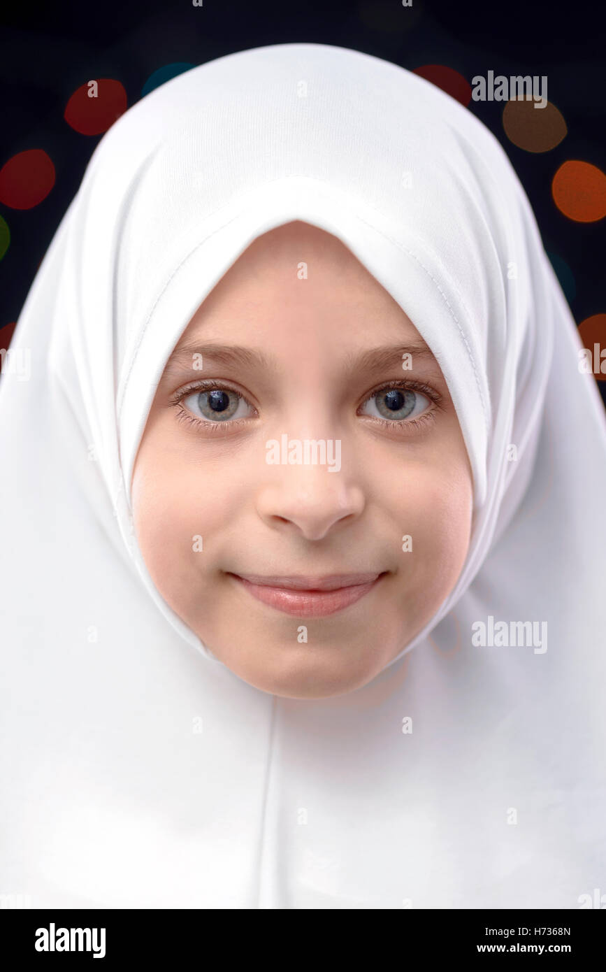 Muslim Girl Hejab Portrait on Defocused Night Lights Background Stock Photo