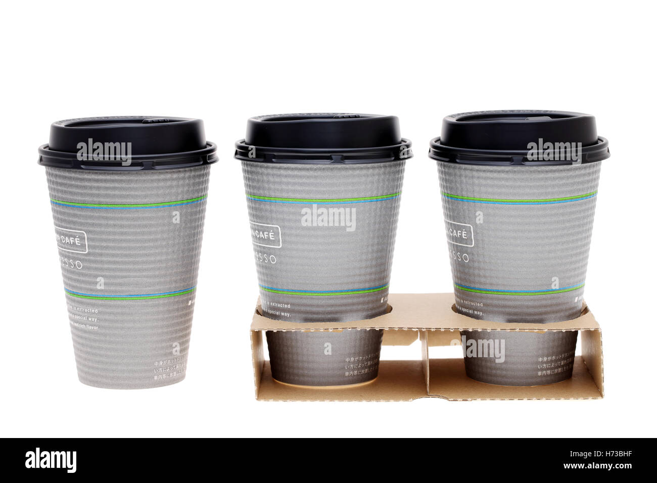 Paper cups of coffee in holder, isolated on white background Stock ...