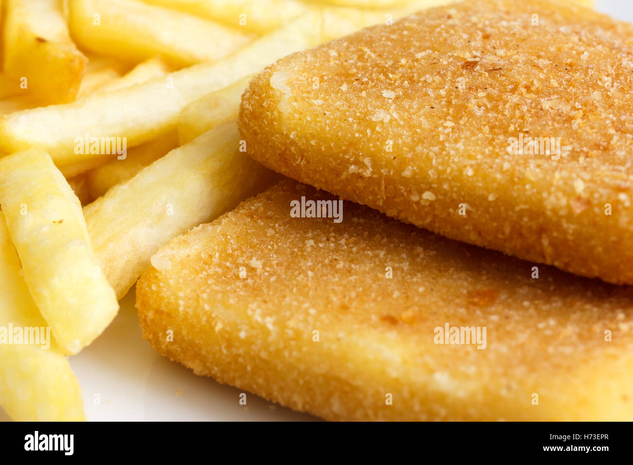 Detail of golden fried cheese, with chips Stock Photo Alamy