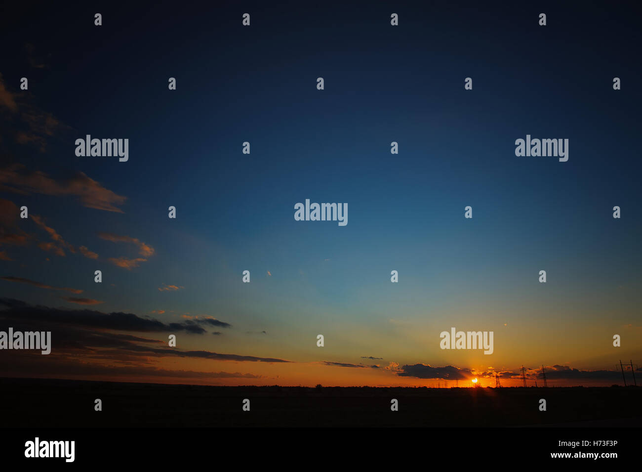 Beautiful colorful sunset or sunrise sky with bright sun rays and ...