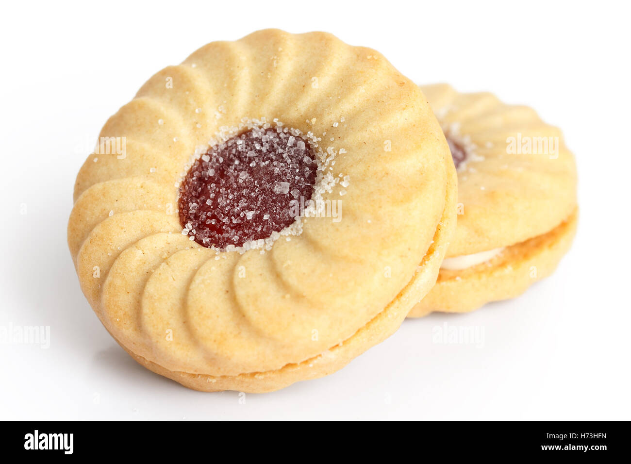 Strawberry jam ring biscuit on white. Stock Photo