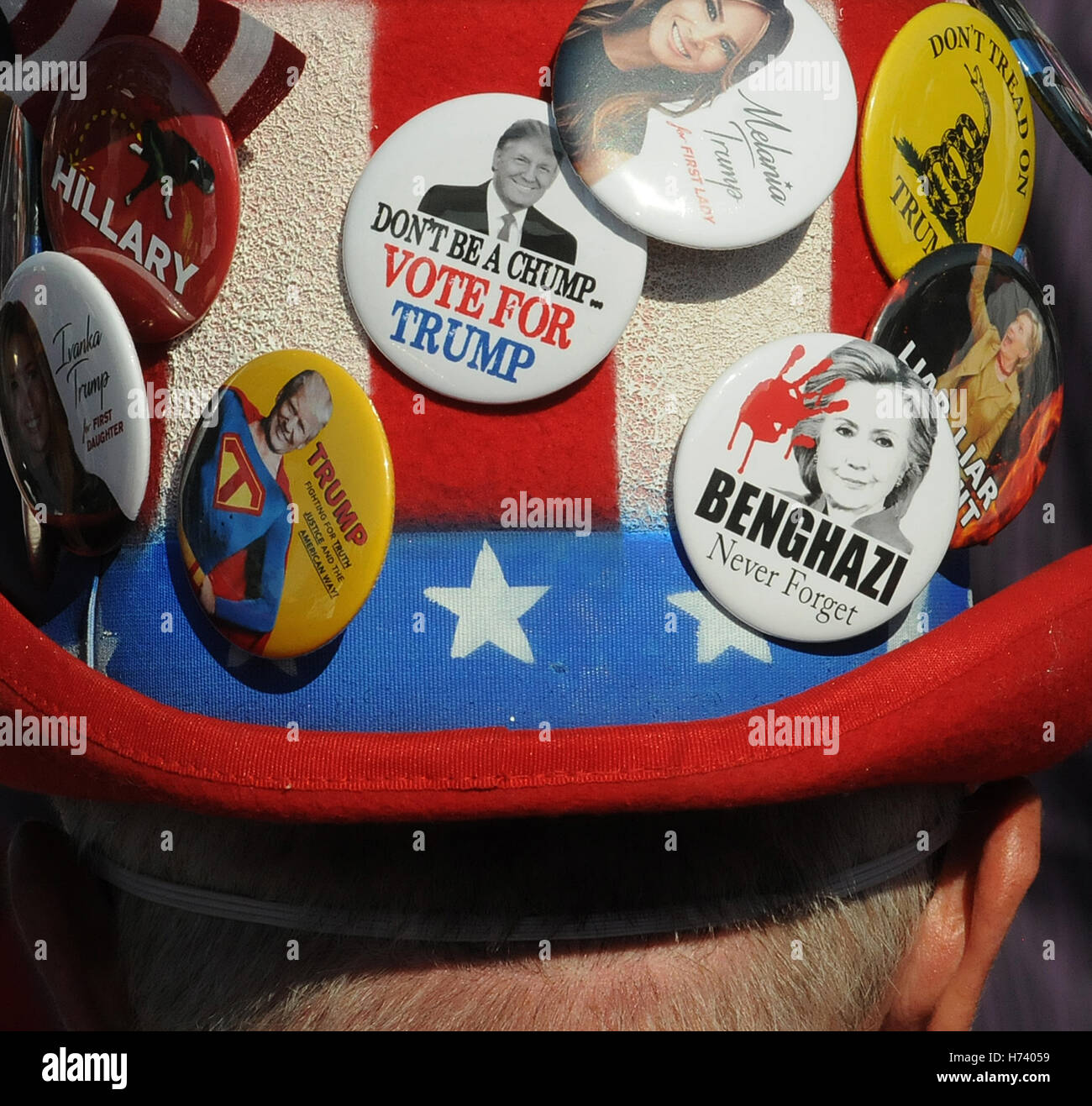 Orlando, Florida, USA. 2nd November, 2016. With the election six days away, a man wears a hat with political buttons at a campaign rally for Republican presidential nominee Donald Trump at the Central Florida Fairgrounds in Orlando, Florida on November 2, 2016. Credit:  Paul Hennessy/Alamy Live News Stock Photo