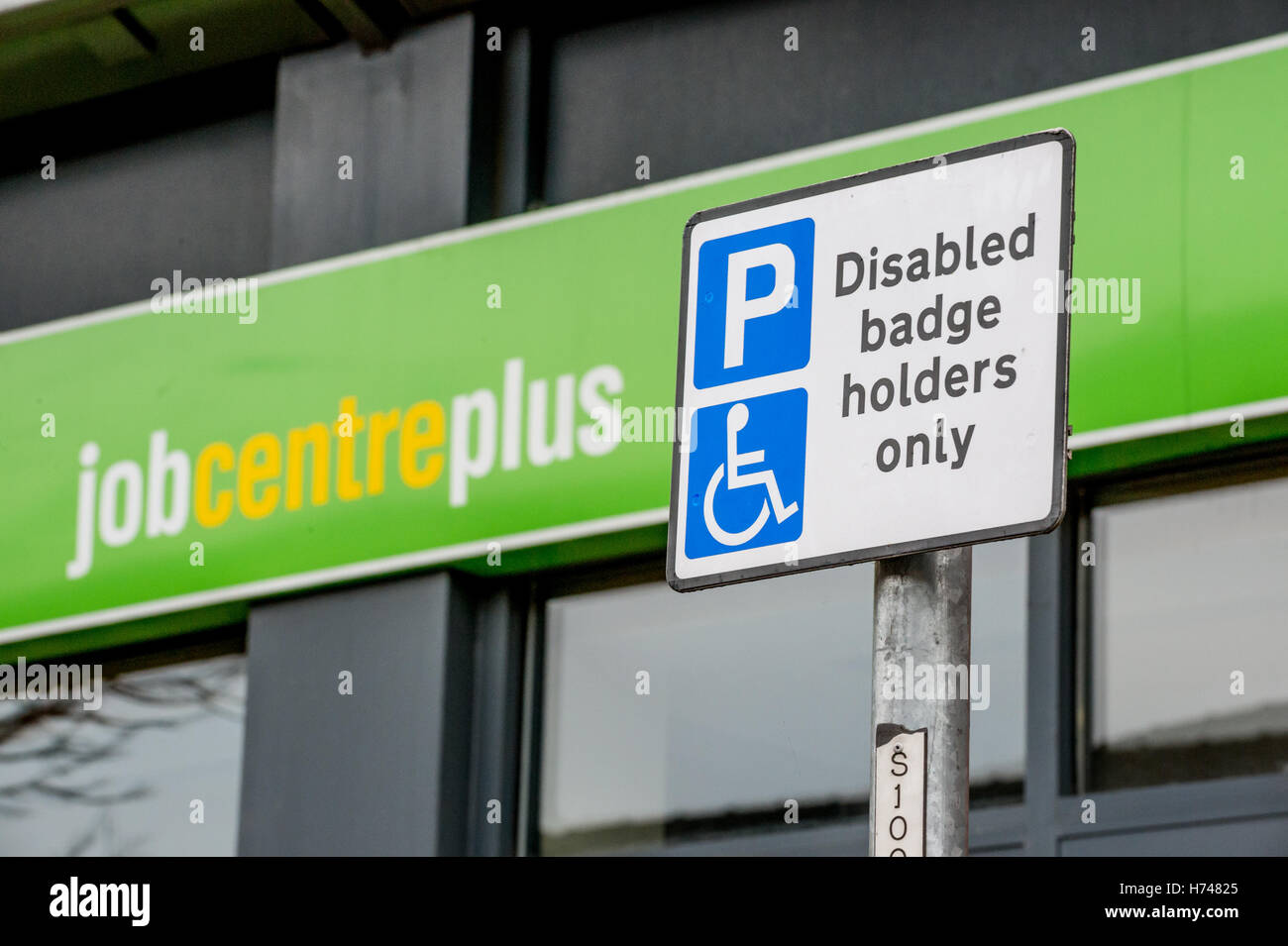 Disabled badge holder sign in front of Job Centre Plus Office