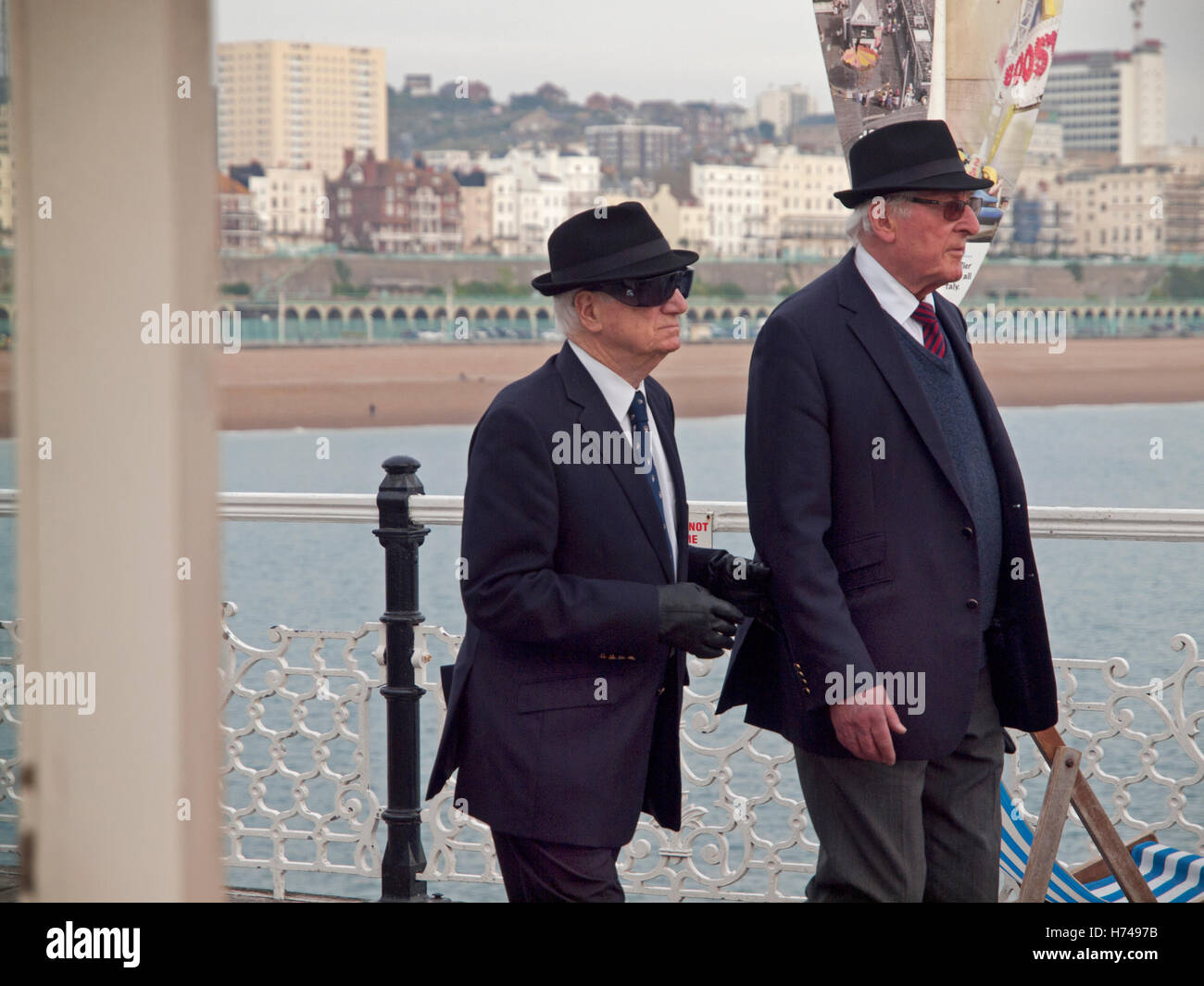 Men in matching hats hi-res stock photography and images - Alamy