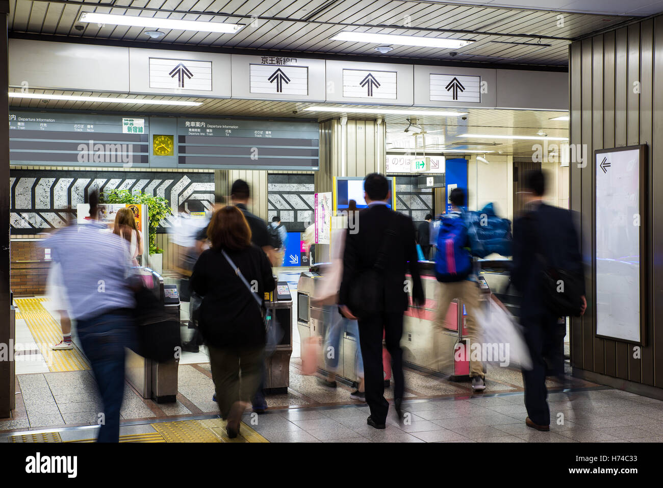 Blurred crowd of people at metro station in Tokyo,  Japan. Metro is a major transportation in Tokyo. Stock Photo