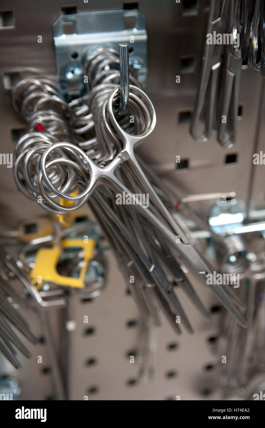 Surgical tools organized on a rack, waiting to be sterilised for ...