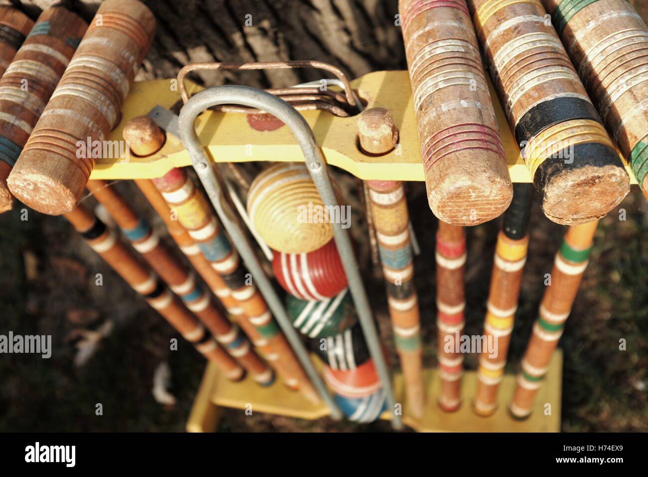 Old croquet set used in outdoor gatherings as a socially competitive recreational activity. Stock Photo